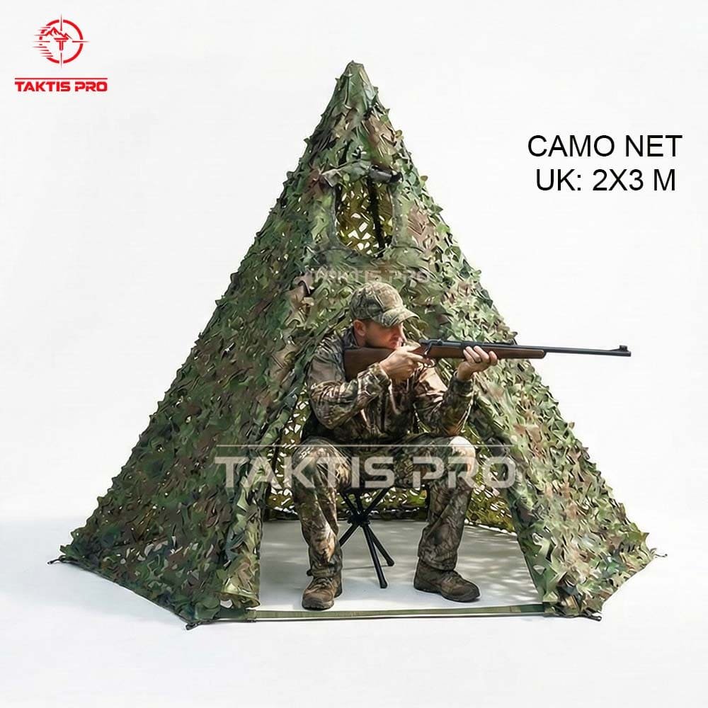 foto seorang pria di dalam jaring kamuflase gear wajib saat nyanggong buruan